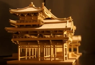 Illustration for article titled Elaborate Buddhist Temple Made From Discarded Amazon Boxes
